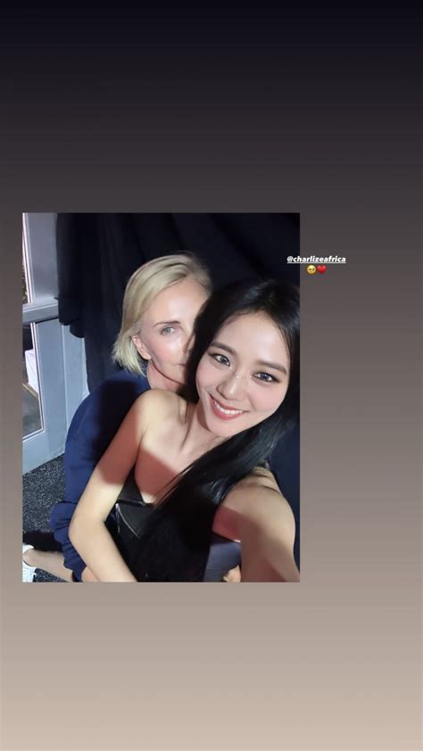 BLACKPINK's Jisoo gets a hug from Charlize Theron while.